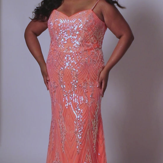 Look beautiful and timeless in this Sydneys Closet SC7366 Long Prom Dress. The fitted plus size gown is embellished with dazzling sequins and a graceful train. Perfect for your next formal event, this elegant dress is sure to make you the bright star of the night. Look glamorous on your big night in this sexy fitted Trumpet gown.