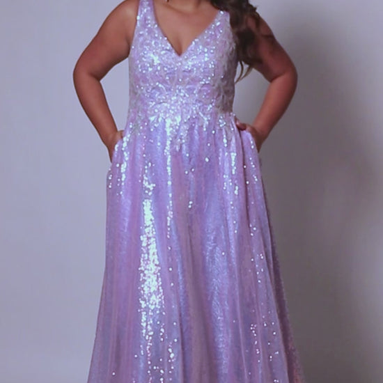 This Sydney's Closet TE2431 Sequin A Line Prom Dress is the perfect choice for plus-size individuals looking for a stunning and elegant formal gown. The V-neckline and A-line silhouette flatter the figure, while the sequin detailing adds a touch of sparkle. Stand out from the crowd at your next special event in this beautiful dress.