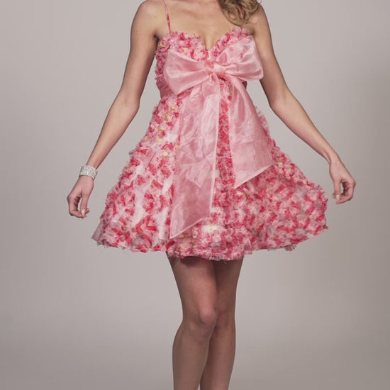 Expertly designed by Dave &amp; Johnny 11769 this short homecoming dress features a charming bow and playful ruffles, creating a flared silhouette for a fun and flirty look. Adorned with a lovely floral print, this cocktail dress is perfect for any special occasion.