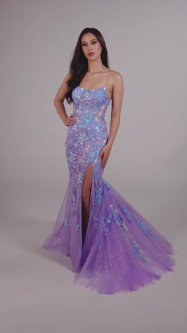 Elevate your prom look with the Ellie Wilde EW35057 dress. The sheer sequin lace corset adds a touch of elegance and the mermaid silhouette enhances your figure. With a daring slit and backless design, this dress is sure to make a statement. A scoop neck completes the look.   Sizes: 00-16  Colors: Lilac, Ice Blue