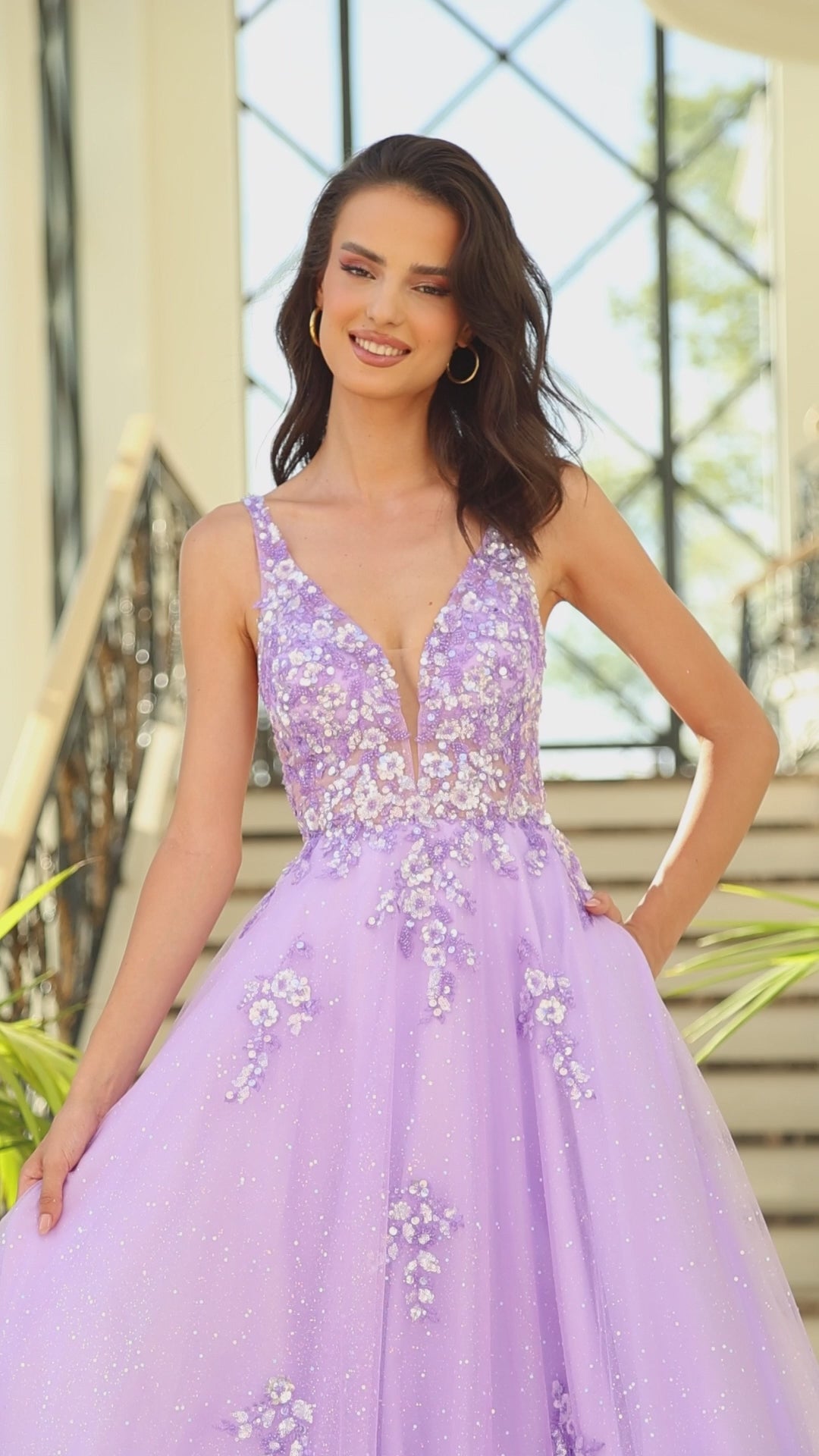 Elevate your formal look with the Amarra 88744 Long Shimmer Ballgown. This stunning dress features intricate sheer sequin detailing and a ruffled tulle A-line skirt that exudes elegance. Perfect for prom or any special occasion, this dress will make you stand out in style. Behold the exquisite prom dress that embodies a floral fantasy and stands as a true work of art.