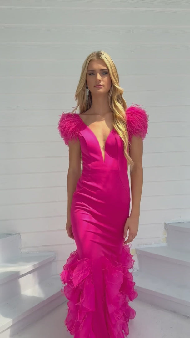 Transform into a red carpet sensation with the Ava Presley 39312 Fitted Long Prom Dress. Designed with a plunging V neckline, ruffles, and feathers, this formal pageant gown exudes glamour and sophistication. Stand out from the crowd and make a bold statement at your next event.