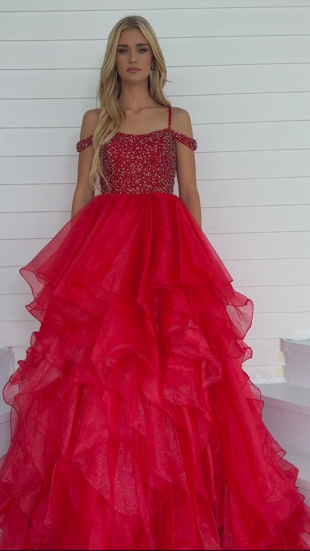 The Ava Presley 28557 Long Prom Dress is the perfect choice for any formal event. With its spaghetti straps, off-shoulder design, and layered organza skirt, this gown exudes elegance and sophistication. The beaded detailing adds a touch of luxury, making you feel like a true pageant queen. You'll turn heads and make a statement in this stunning dress.