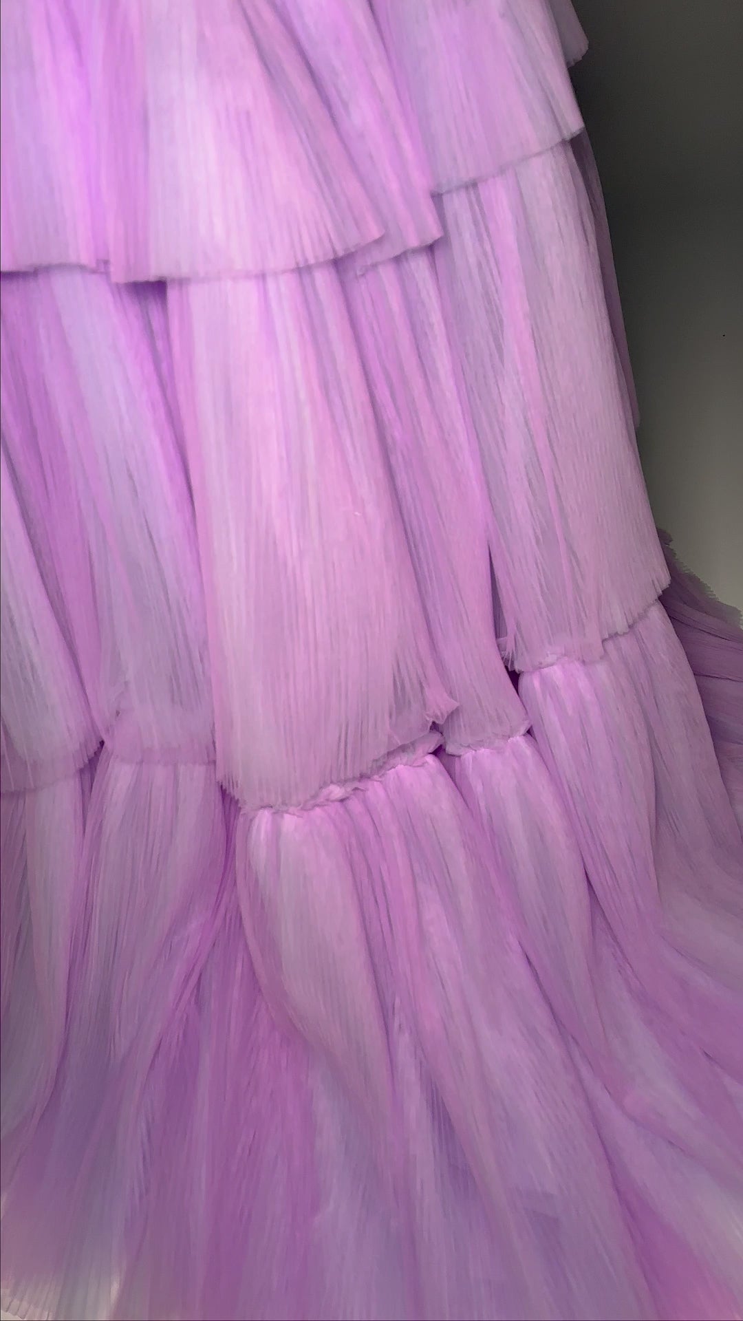 Turn heads at prom or pageants with the Ashley Lauren 11619 Long Prom Dress. This stunning two-tone tiered tulle ball gown features a sleek left leg slit, adding a touch of elegance to your look. Expertly crafted with top-quality materials, this dress is perfect for making a statement and feeling confident. Tiered dreams! This two-tone tired tulle ball gown features a one shoulder design and a left leg slit.