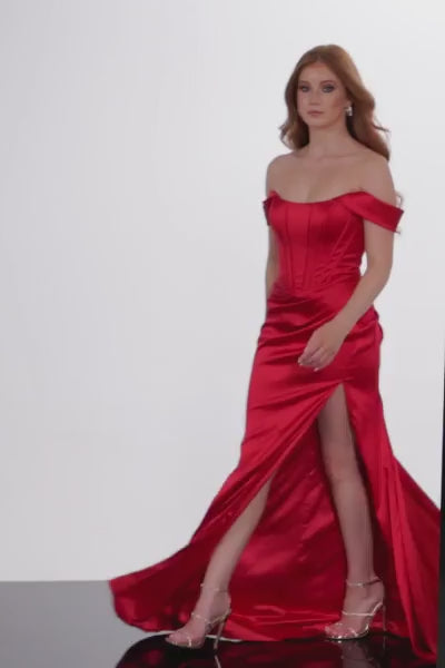 The Jovani 23368 is an exquisite prom dress designed to captivate attention with its meticulous details. The stretch satin material lends a luxurious touch to the form-fitting silhouette, accentuating the wearer's curves. The floor-length skirt features a high slit and a sweeping train, evoking a sense of drama and elegance. Ruching at the hips adds a flattering and stylish element, contributing to the overall sophistication of the dress.