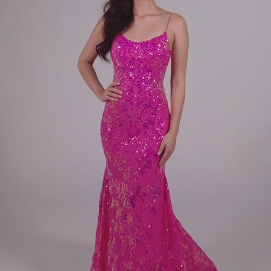 The Ellie Wilde EW35015 is a unique showstopper, featuring a fitted sequin stretch mesh fabric with a long length, scoop neckline, mermaid silhouette, sleeveless design, open back and natural waistline. Perfect for pageants, prom or any special occasion.  COLOR: MIDNIGHT, LIGHT BLUE, LILAC, HOT PINK SIZE: 00 - 16