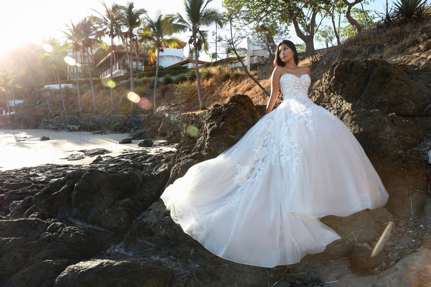 Davinci Bridal 50668 is an A Line formal wedding dress. Featuring a fitted bodice with off the shoulder sheer removable straps and sweetheart neckline. Floral lace embellishments over a sequin shimmer ballgown skirt with train. Lace up corset back.   Available Sizes: 2-20  Available Colors: Ivory/Ivory, Ivory/Latte, White/White