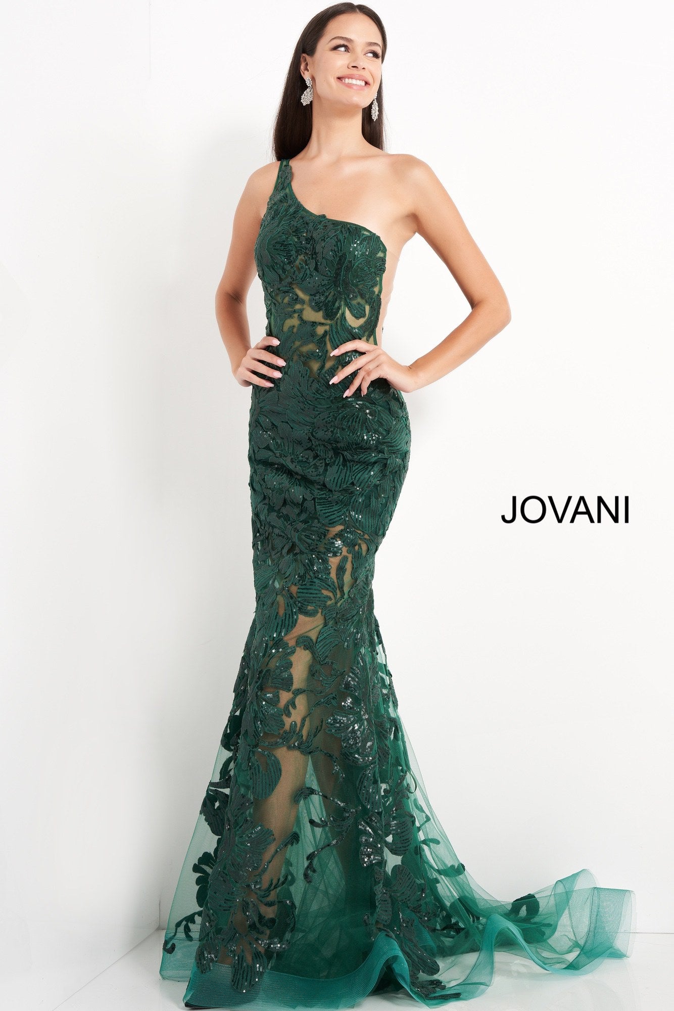 Jovani 02895 is a long fitted one shoulder formal evening gown. Featuring a sheer fitted bodice and skirt. Sequin embellished lace appliques. Mermaid silhouette. sheer side panels with mesh insert. sweeping train with horse hair trim. Great Prom & Pageant Dress.  Available Sizes: 00,0,2,4,6,8,10,12,14,16,18,20,22,24  Available Colors: black, forest, light-blue, red, rose/gold, royal, w