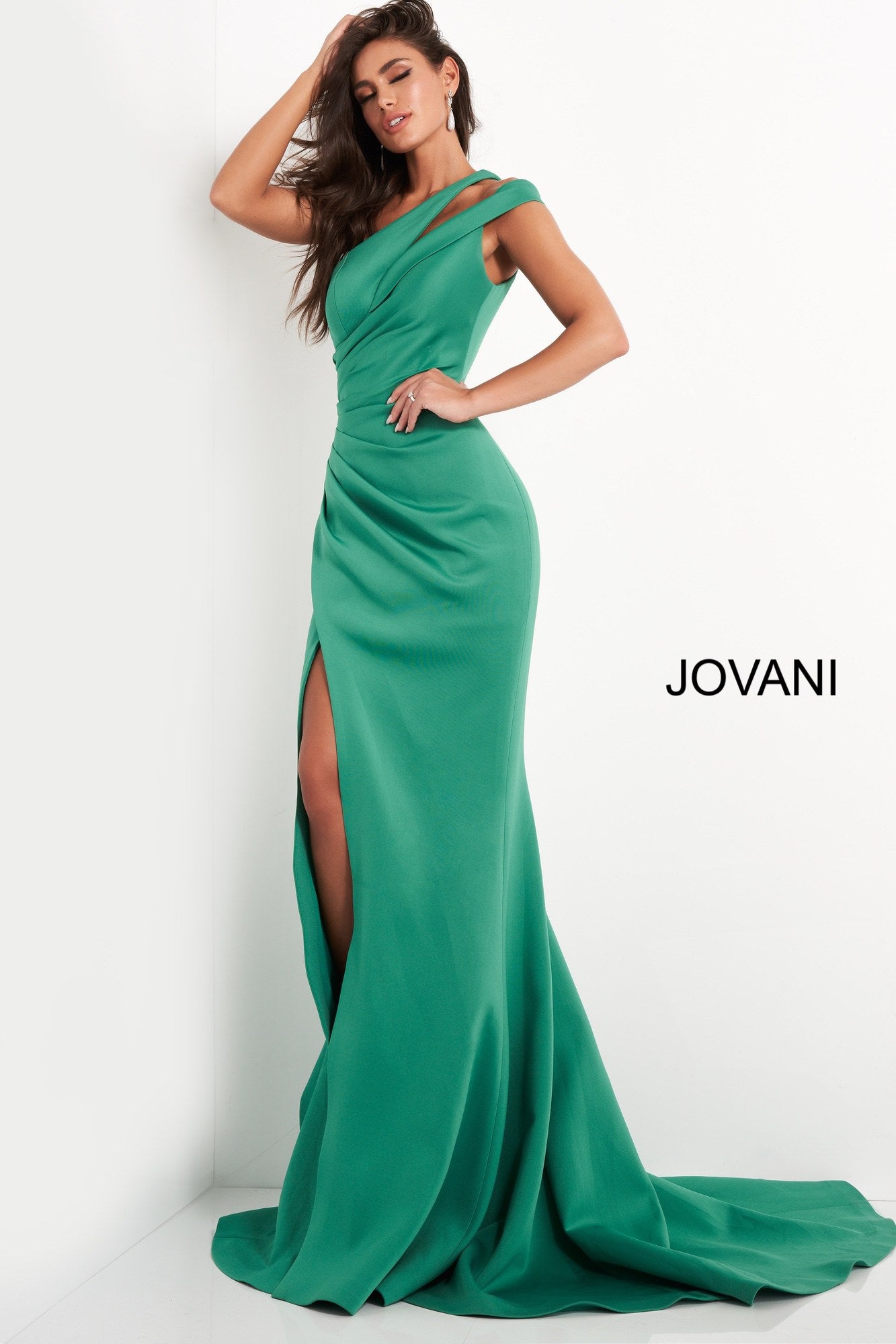 Jovani 04222 This long Jovani evening gown has a double one shoulder strap with a cutout.  This prom and pageant dress has full ruching down the front of the gown giving away to a side slit and long train.   Colors   Black, Green, Light Blue, Navy, Tomato, Wine  Sizes:  00-24 