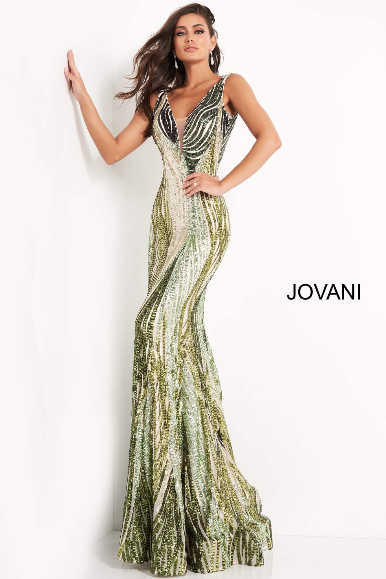 Jovani 05103 is a Long Fitted Mermaid Prom Dress. Featuring a Depp V Plunging Neckline with mesh insert. Green Sequin Multi Embellished Bodice cascading into the lush trumpet skirt. This Pageant Dress Features a sweeping train perfect for the stage!  Available Sizes: 00,0,2,4,6,8,10,12,14,16,18,20,22,24  Available Colors: Green