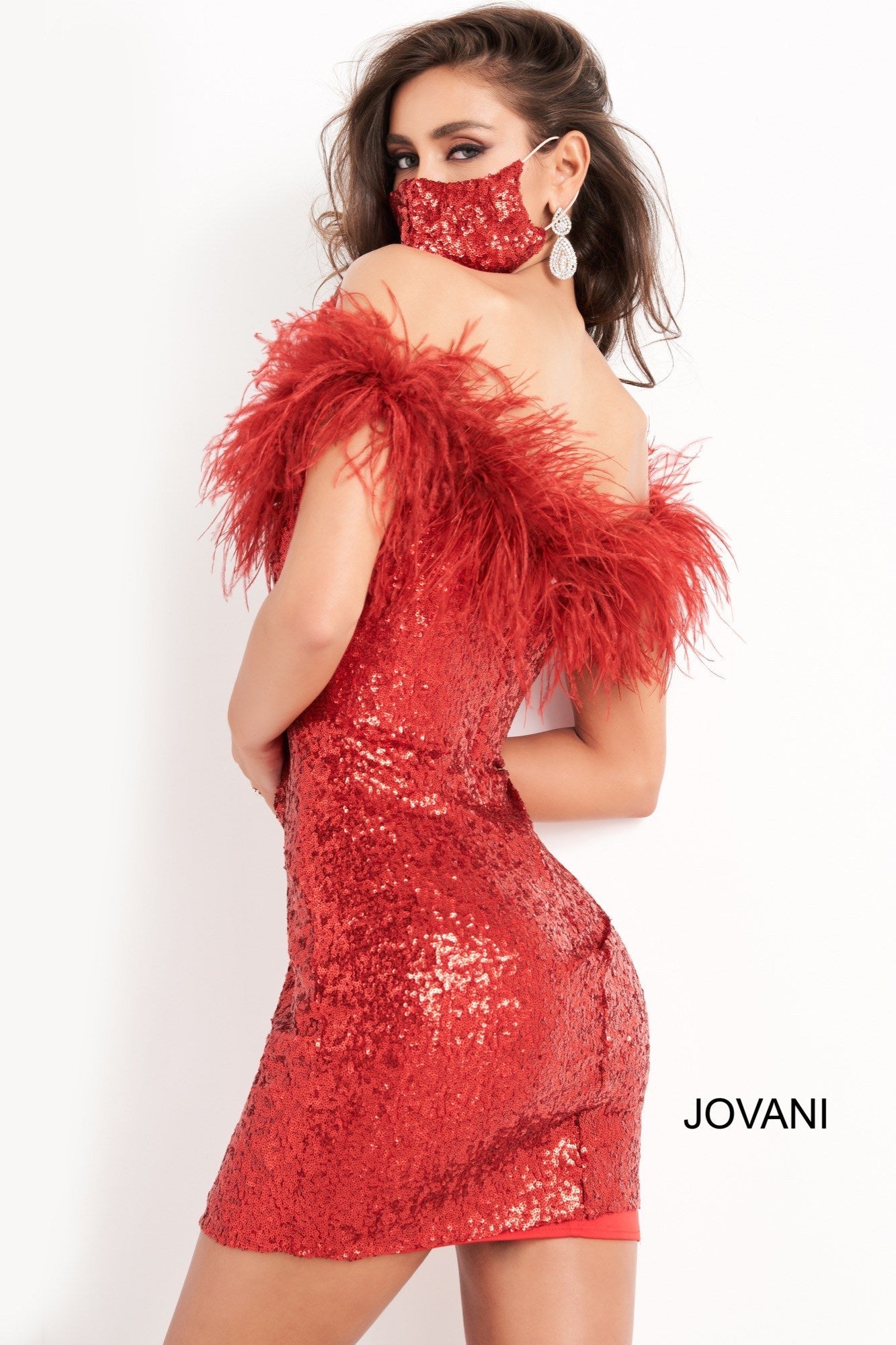 Jovani 06167 is a short fitted sequin cocktail evening dress. Featuring a straight neckline with off the shoulder feather embellished straps. Fitted Stretch Sequin bodice is perfect for any formal event or occasion! Sexy wedding reception dress in Ivory or Little black dress.  Available Sizes: 00,0,2,4,6,8,10,12,14,16,18,20,22,24  Available Colors: Black, Red, Ivory