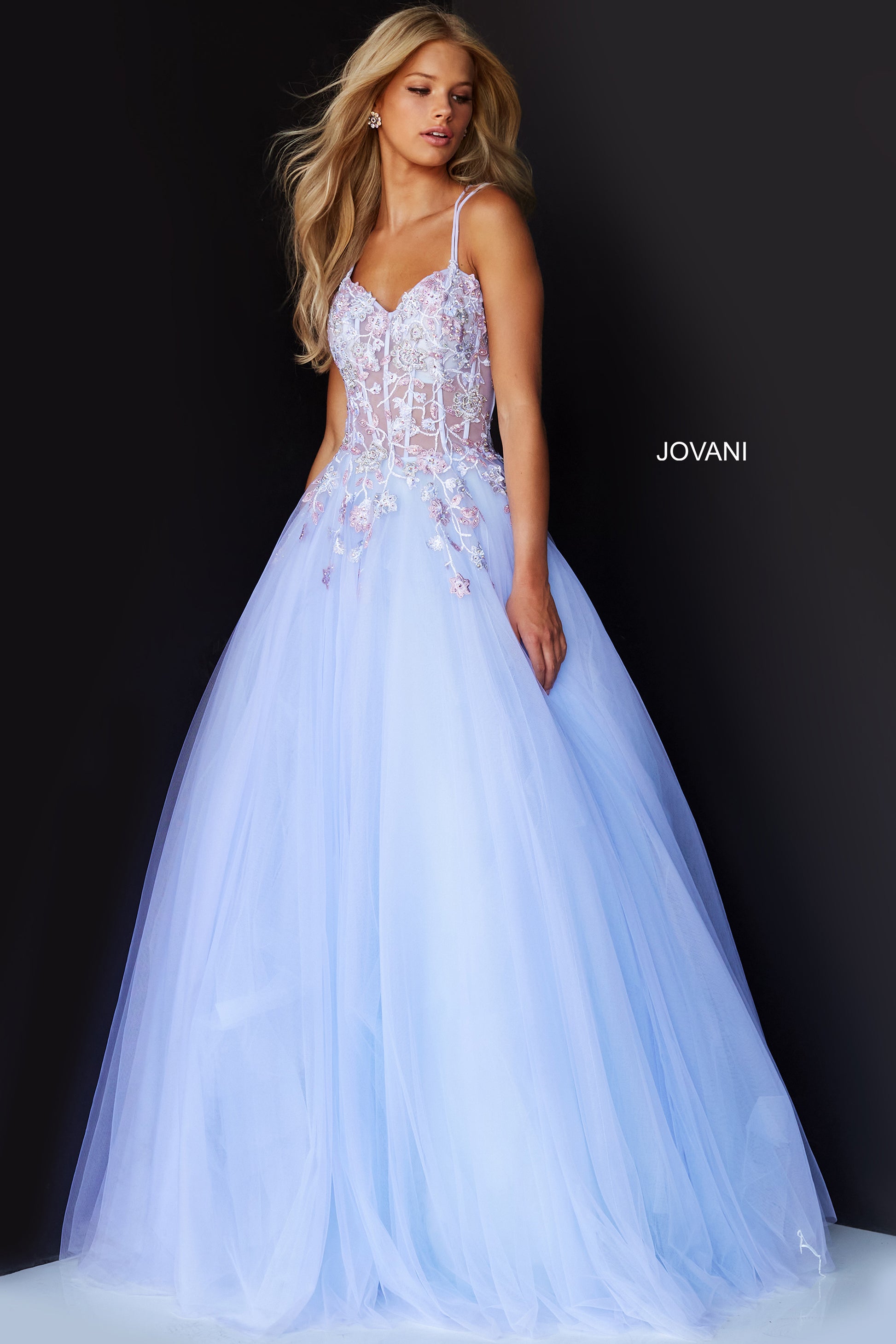 Jovani 06207 Lilac Prom Dress by Jovani.  V neckline sheer floral embellished corset bodice with a v neckline and crisscross tie open low back.  Tulle skirt. 