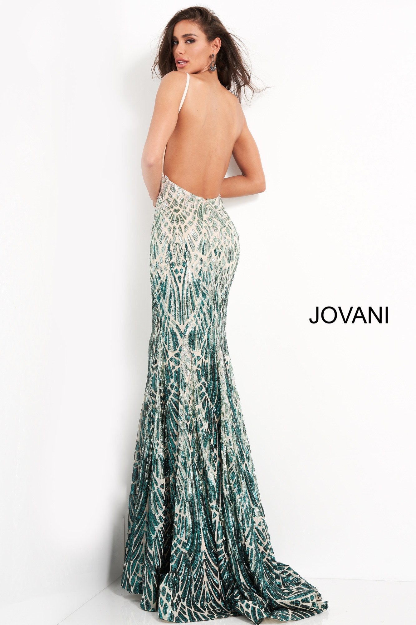 Jovani 06450 is a Gorgeous Long Fitted mermaid Formal evening gown. This Prom Dress Features an open Back with spaghetti straps. Ombre Sequin Color Shift on this Mermaid Pageant Dress. Lush Trumpet skirt with a sweeping train. Fully Embellished sequin Geometric pattern to accentuate any figure! Available Sizes: 00,0,2,4,6,8,10,12,14,16,18,20,22,24 Available Colors: silver/cafe, silver/green