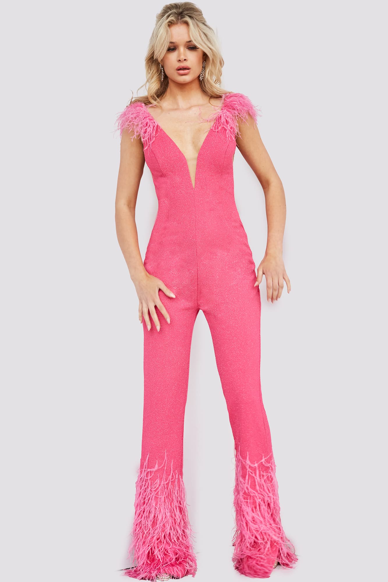 Jovani 08554 Shimmer Jumpsuit Feather Pant Legs Slit V Neck Formal Pageant Wear This Jovani 08554 hot pink contemporary jumpsuit features a fitted silhouette in glitter stretch, accented with ostrich feathers on the shoulders and hem.  Available Sizes: 00,0,2,4,6,8,10,12,14,16,18,20,22,24  Available Colors: Black, Hot Pink