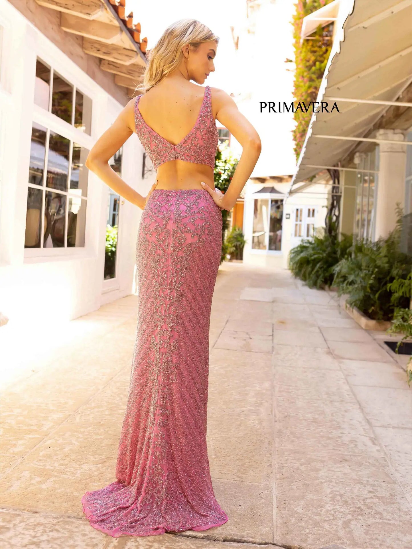 Primavera Couture 12061 Prom Dress Long Beaded gown. This gown has such a beautiful design on it. it also has an open back. 