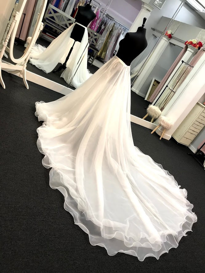 Ashley Lauren 1739 is a Long cathedral length organza multi layered overskirt with a ruffle hem. This Pageant & Bridal Over skirt is a Truly stunning addition to any gown!