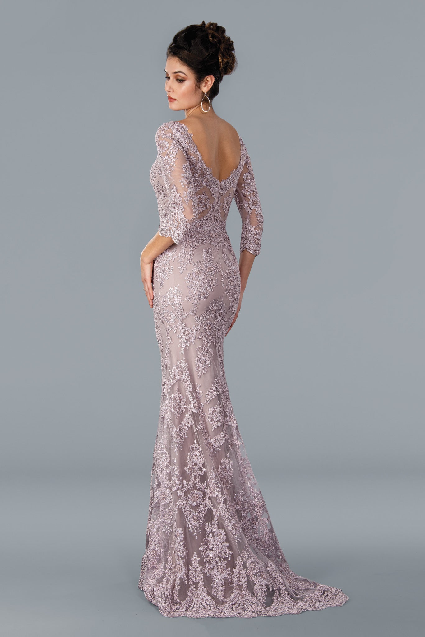 Stella Couture 22354 is a long-sleeved, sheer formal dress perfect for a wedding. Crafted from delicate lace, this elegant silhouette flatters and highlights your figure. The perfect wedding guest gown. Stella Couture 22354 Long Fitted Gown Lace High Neck  Available Color- Rose  Available Size- 4-20