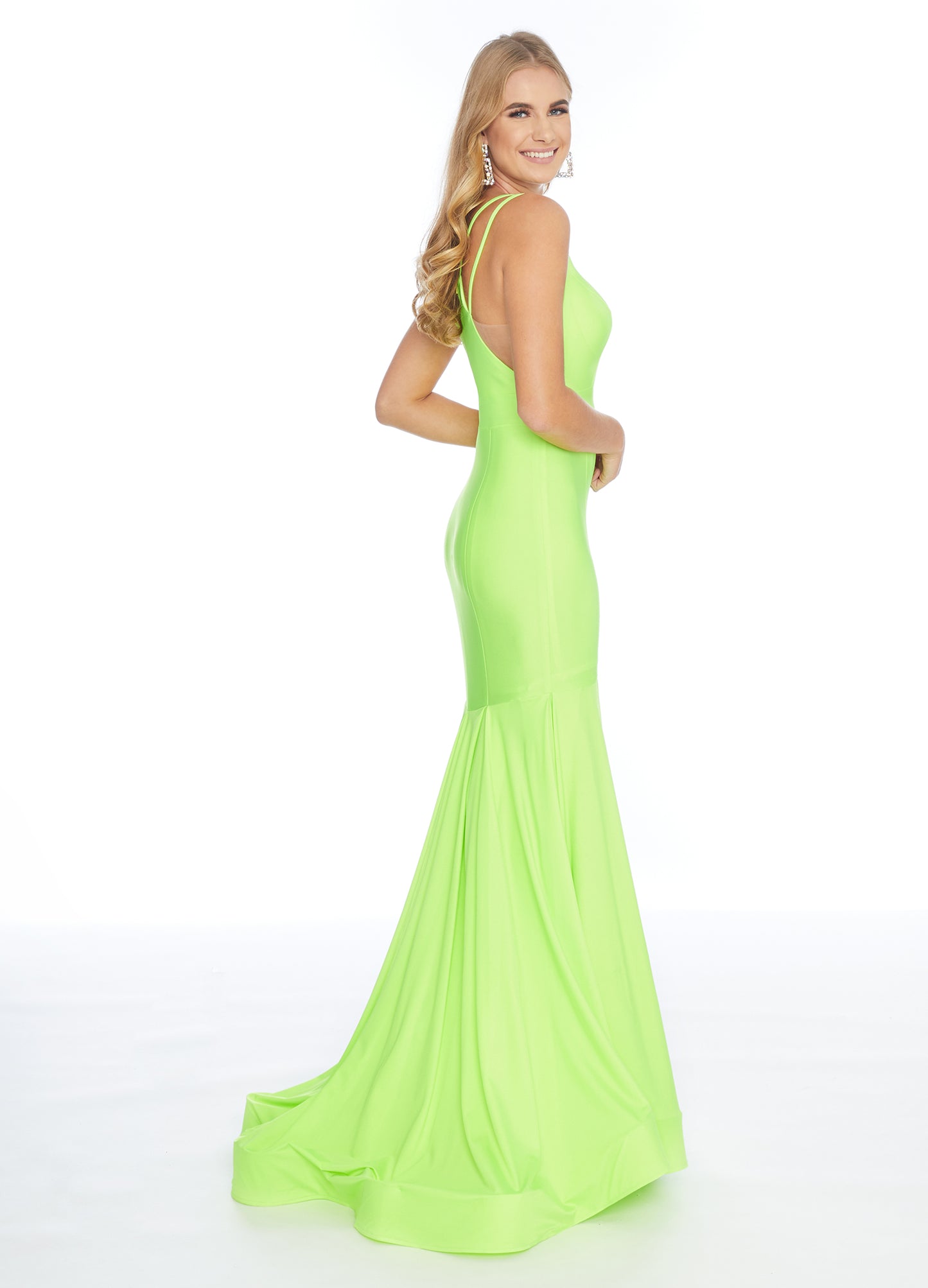 Ashley Lauren 1870 This stunning fit & flare evening gown is sure to turn heads! The bustier is has a v-neckline complete with double spaghetti straps and illusion panel sides. The skirt embellished with box-pleats and sweeping train. Racer Back Jersey  Available Sizes: 2  Available Colors: Neon Green