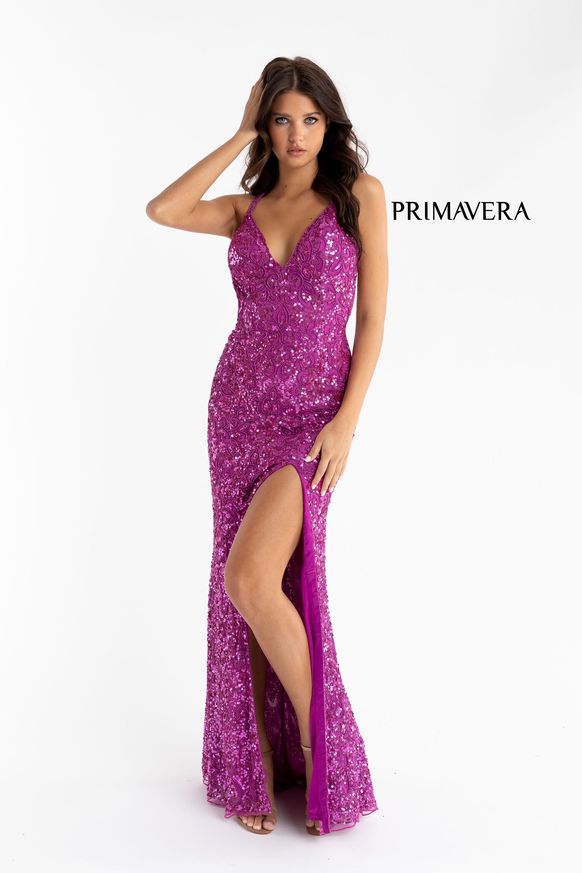 Primavera Couture 3295 Exclusive  Prom Dress, Formal Evening Gown.  This exclusive prom dress is designed with sequins throughout.  I has a V neckline with beaded spaghetti straps that crisscross in the open back.  It is long with a left side slit.  Available Colors:  FUSHIA,CREAM,EMERALD,IVORY,PEACOCK,BLACK,MIDNIGHT,NEON LILAC,NEON PINK,FORREST GREEN,PURPLE,TURQUOISE,CORAL,BLUE,RED,LIGHT BLUE,NEON SAGE