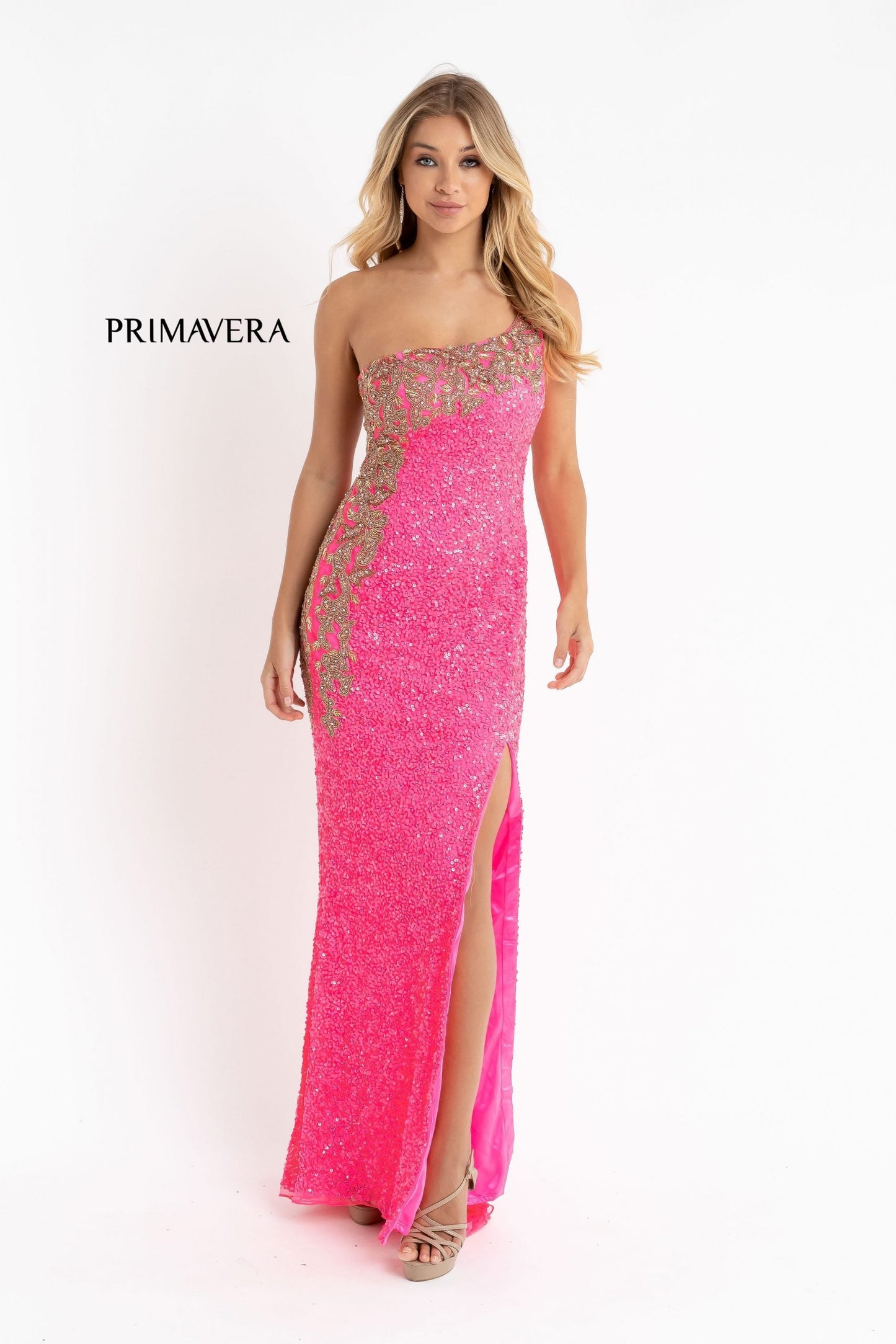 Primavera Couture 3637 is a stunning Long Fitted Sequin Embellished Formal Evening Gown. This One Shoulder Prom Dress Features Beaded Embellishments cascading from the one shoulder neckline down the side of the gown along the hip. Slit in skirt with a sweeping train. Great Pageant Formal Style.