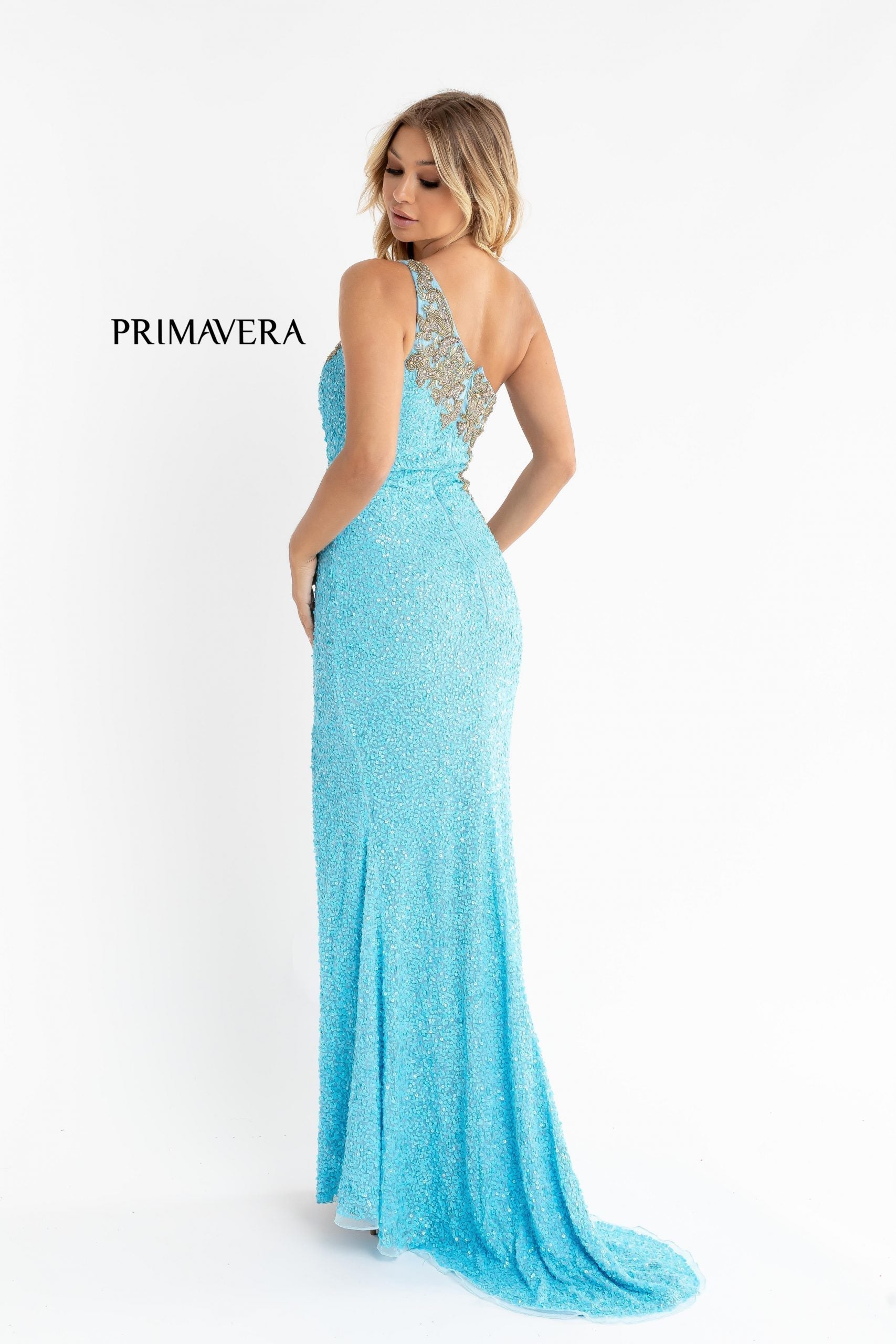 Primavera Couture 3637 is a stunning Long Fitted Sequin Embellished Formal Evening Gown. This One Shoulder Prom Dress Features Beaded Embellishments cascading from the one shoulder neckline down the side of the gown along the hip. Slit in skirt with a sweeping train. Great Pageant Formal Style.