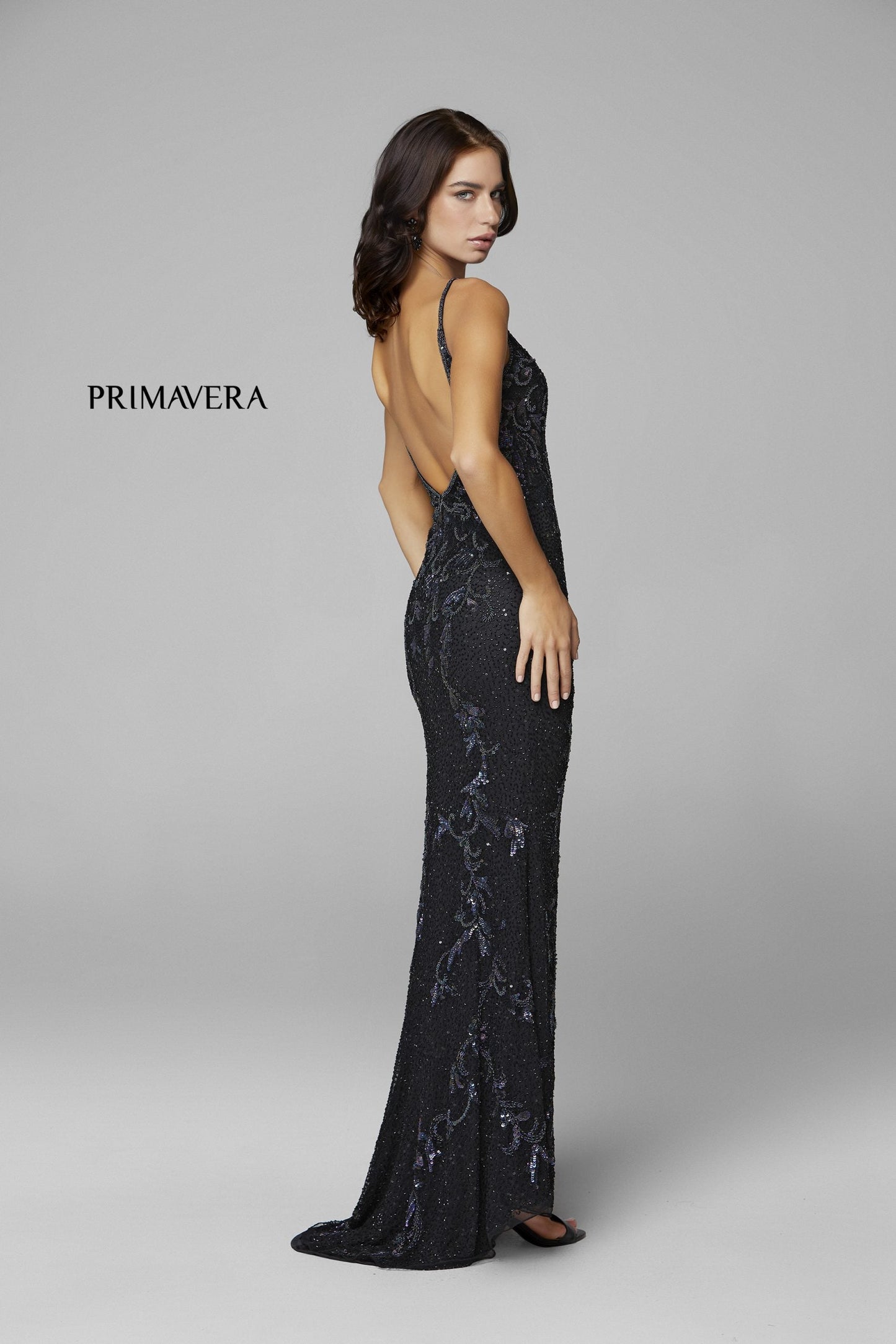 Primavera Couture 3727 This is a beautiful long beaded prom dress.  The V neckline is surrounded by gorgeous floral details that extend down the sides of the dress.  The back is a v open back and the skirt has a slit and sweeping train.  A magnificent choice for prom or formal evening dress.  Available colors:  Midnight, Black, Ivory, Mint, Red, Rose, Neon Pink,   Available sizes:  000-24