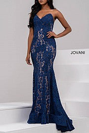 Jovani 37334 This beautiful, fitted, strapless lace dress features a sweetheart neckline. The top half of the trumpet dress is accessorized with rhinestones. Stretch nude lining with stretch lace overlay, heat set stones, form fitting, strapless. Available Sizes: 00,0,2,4,6,8,10,12,14,16,18,20,22,24  Available Colors: BLACK, BRIGHT PINK, DUSTY PINK, EMERALD, FUCHSIA, IVORY, LIGHT-BLUE, LILAC, MAUVE, NAVY, PERRIWINKLE, RED, ROYAL