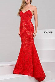 Jovani 37334 This beautiful, fitted, strapless lace dress features a sweetheart neckline. The top half of the trumpet dress is accessorized with rhinestones. Stretch nude lining with stretch lace overlay, heat set stones, form fitting, strapless. Available Sizes: 00,0,2,4,6,8,10,12,14,16,18,20,22,24  Available Colors: BLACK, BRIGHT PINK, DUSTY PINK, EMERALD, FUCHSIA, IVORY, LIGHT-BLUE, LILAC, MAUVE, NAVY, PERRIWINKLE, RED, ROYAL