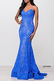 Jovani 37334 This beautiful, fitted, strapless lace dress features a sweetheart neckline. The top half of the trumpet dress is accessorized with rhinestones. Stretch nude lining with stretch lace overlay, heat set stones, form fitting, strapless. Available Sizes: 00,0,2,4,6,8,10,12,14,16,18,20,22,24  Available Colors: BLACK, BRIGHT PINK, DUSTY PINK, EMERALD, FUCHSIA, IVORY, LIGHT-BLUE, LILAC, MAUVE, NAVY, PERRIWINKLE, RED, ROYAL