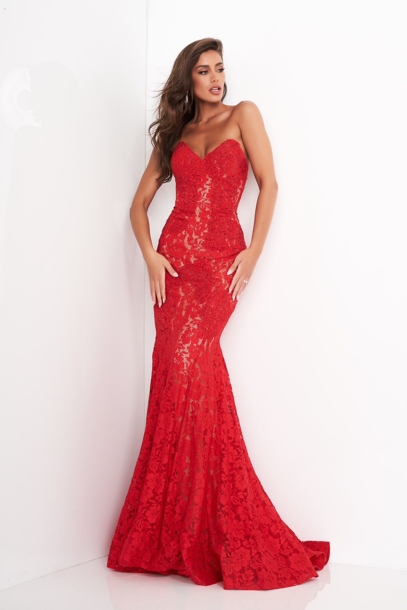 Jovani 37334 This beautiful, fitted, strapless lace dress features a sweetheart neckline. The top half of the trumpet dress is accessorized with rhinestones. Stretch nude lining with stretch lace overlay, heat set stones, form fitting, strapless. Available Sizes: 00,0,2,4,6,8,10,12,14,16,18,20,22,24  Available Colors: BLACK, BRIGHT PINK, DUSTY PINK, EMERALD, FUCHSIA, IVORY, LIGHT-BLUE, LILAC, MAUVE, NAVY, PERRIWINKLE, RED, ROYAL