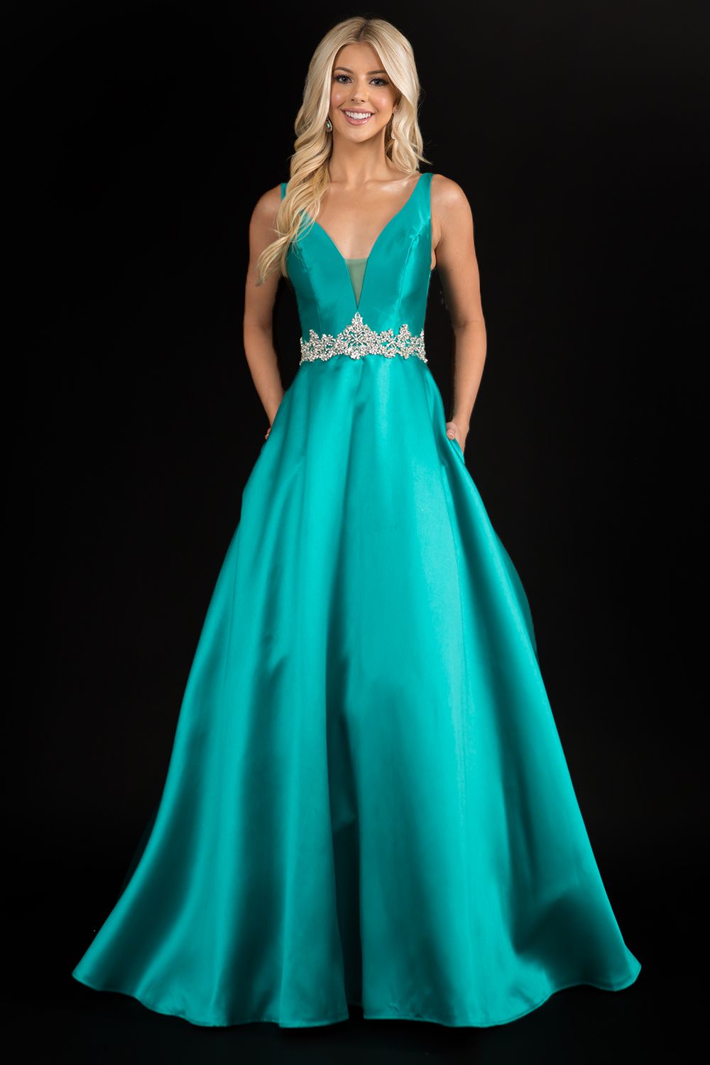 Nina Canacci 2297 plunging neckline A line prom dress formal evening gown with an embellished waistline. Perfect for a wedding dress in Ivory.   Color: Ivory, Emerald, Royal  Sizes:  8,10,12,14,16, 18, 20, 22, 24 