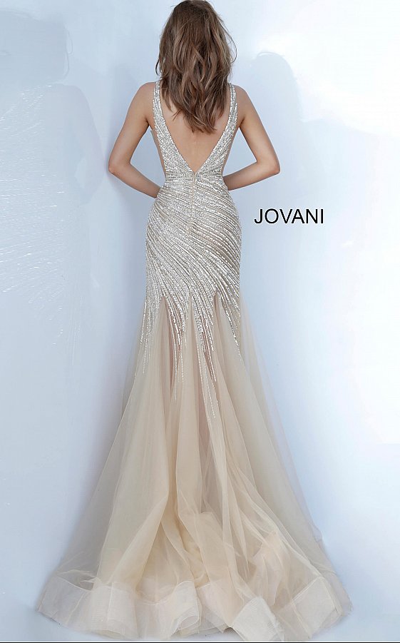 Jovani 4741is a long 2020 Prom, Pageant & Formal Evening Dress. Featuring a Heavily crystal embellished bodice cascading into the Sheer flared trumpet tulle skirt. Deep V neckline with an open V back. Sheer mesh cutout side panels. Full Tulle Trumpet skirt. Perfect for Pageants & Red Carpet Events!  Available Colors: Nude, Sage  Available Sizes: 00,0,2,4,6,8,10,12,14,16,18,20,22,24