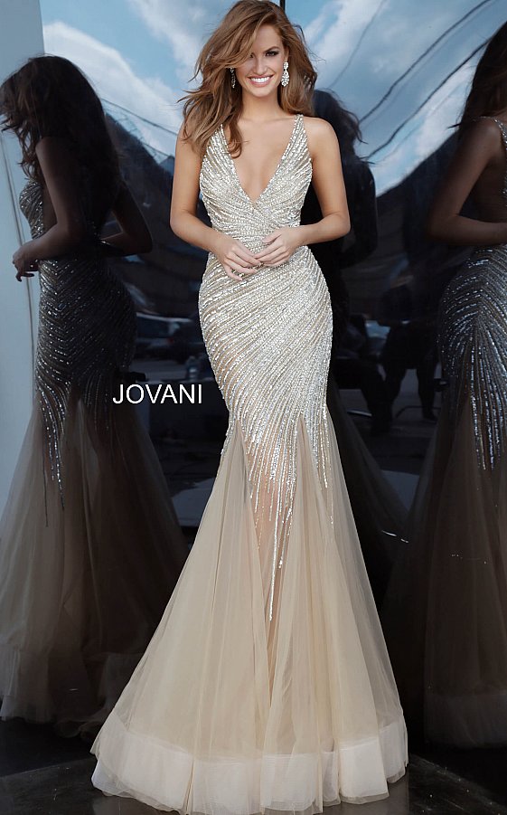 Jovani 4741is a long 2020 Prom, Pageant & Formal Evening Dress. Featuring a Heavily crystal embellished bodice cascading into the Sheer flared trumpet tulle skirt. Deep V neckline with an open V back. Sheer mesh cutout side panels. Full Tulle Trumpet skirt. Perfect for Pageants & Red Carpet Events!  Available Colors: Nude, Sage  Available Sizes: 00,0,2,4,6,8,10,12,14,16,18,20,22,24