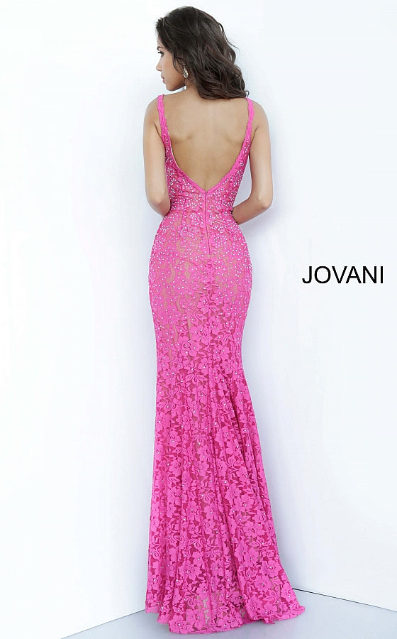 Jovani 48994 Stretch lace prom dress embellished with heat set stones, nude underlay, fitted silhouette, straps over shoulders, plunging v neckline with sheer mesh, sheer mesh inserts along the sides, sweeping train, low v back. Makes an excellent pageant gown or evening gown. 