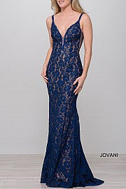 Jovani 48994 Stretch lace prom dress embellished with heat set stones, nude underlay, fitted silhouette, straps over shoulders, plunging v neckline with sheer mesh, sheer mesh inserts along the sides, sweeping train, low v back. Makes an excellent pageant gown or evening gown. 