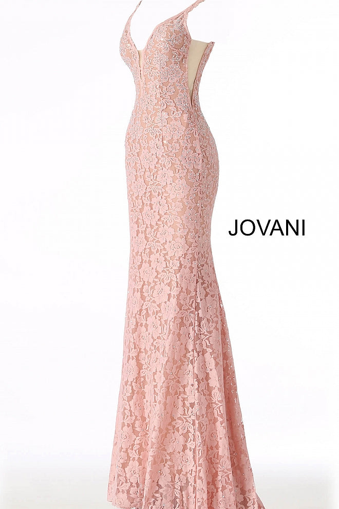 Jovani 48994 Stretch lace prom dress embellished with heat set stones, nude underlay, fitted silhouette, straps over shoulders, plunging v neckline with sheer mesh, sheer mesh inserts along the sides, sweeping train, low v back. Makes an excellent pageant gown or evening gown. 