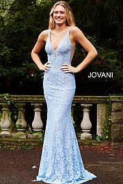 Jovani 48994 Stretch lace prom dress embellished with heat set stones, nude underlay, fitted silhouette, straps over shoulders, plunging v neckline with sheer mesh, sheer mesh inserts along the sides, sweeping train, low v back. Makes an excellent pageant gown or evening gown. 