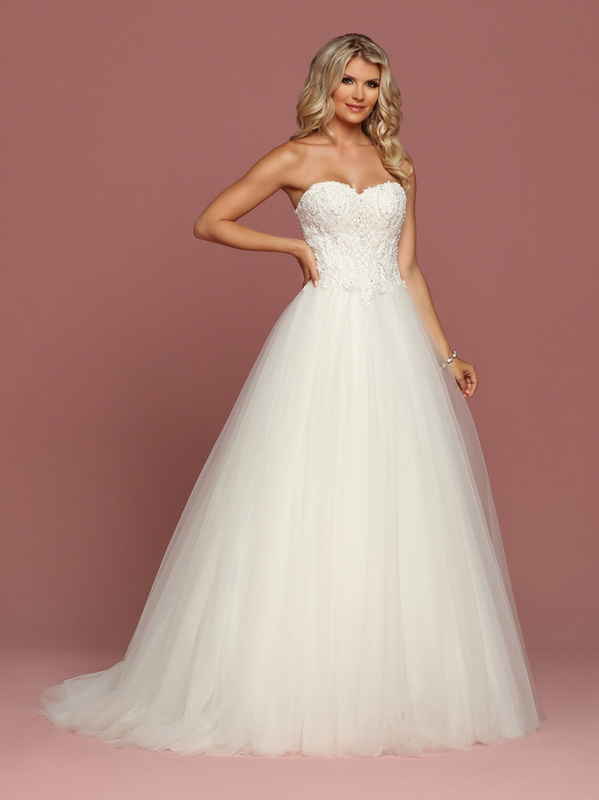 Davinci Bridal 50487 is a strapless sweetheart Tulle ballgown wedding dress. Featuring an Embellished lace bodice cascading into the lush tulle skirt. Corset Lace up back.  Available for 1-2 Week Delivery!!!  Available Sizes: 2,4,6,8,10,12,14,16,18,20  Available Colors: Ivory