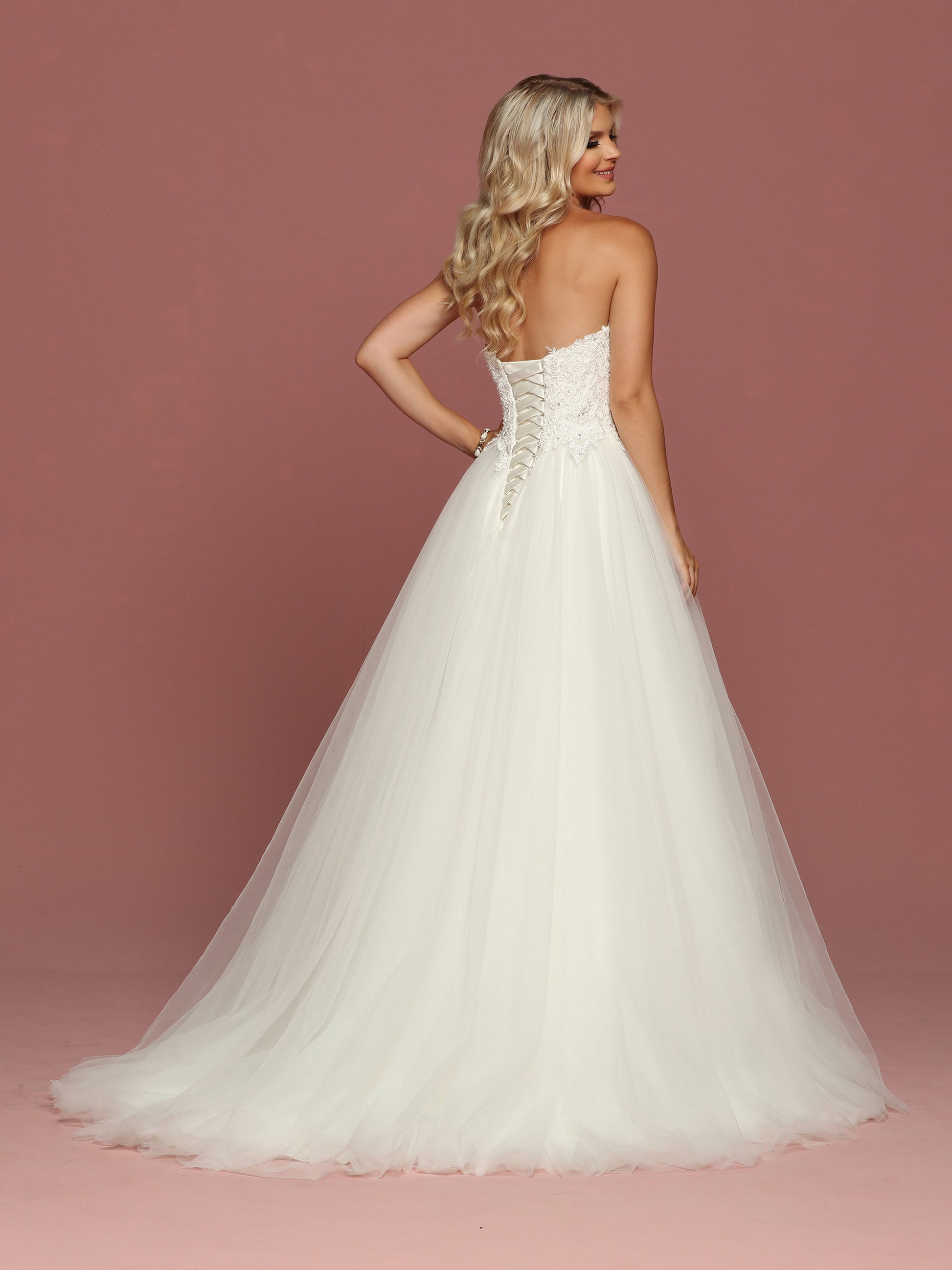 Davinci Bridal 50487 is a strapless sweetheart Tulle ballgown wedding dress. Featuring an Embellished lace bodice cascading into the lush tulle skirt. Corset Lace up back.  Available for 1-2 Week Delivery!!!  Available Sizes: 2,4,6,8,10,12,14,16,18,20  Available Colors: Ivory