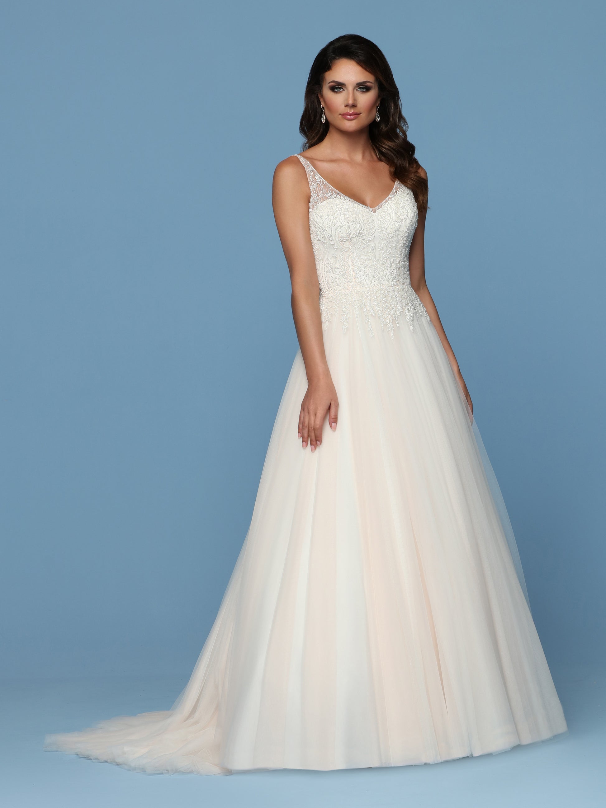 Davinci Bridal 50544 is a Beautiful Lush Soft Tulle A Line Ball Gown with a Hand Embellished Bodice cascading into to tulle skirt. Sweetheart Neckline with a sheer Illusion V Neck and straps leading around to an open V back.  Available for 1-2 Week Delivery!!!  Available Sizes: 2,4,6,8,10,12,14,16,18,20  Available Colors: Ivory/Blush, Ivory/Ivory