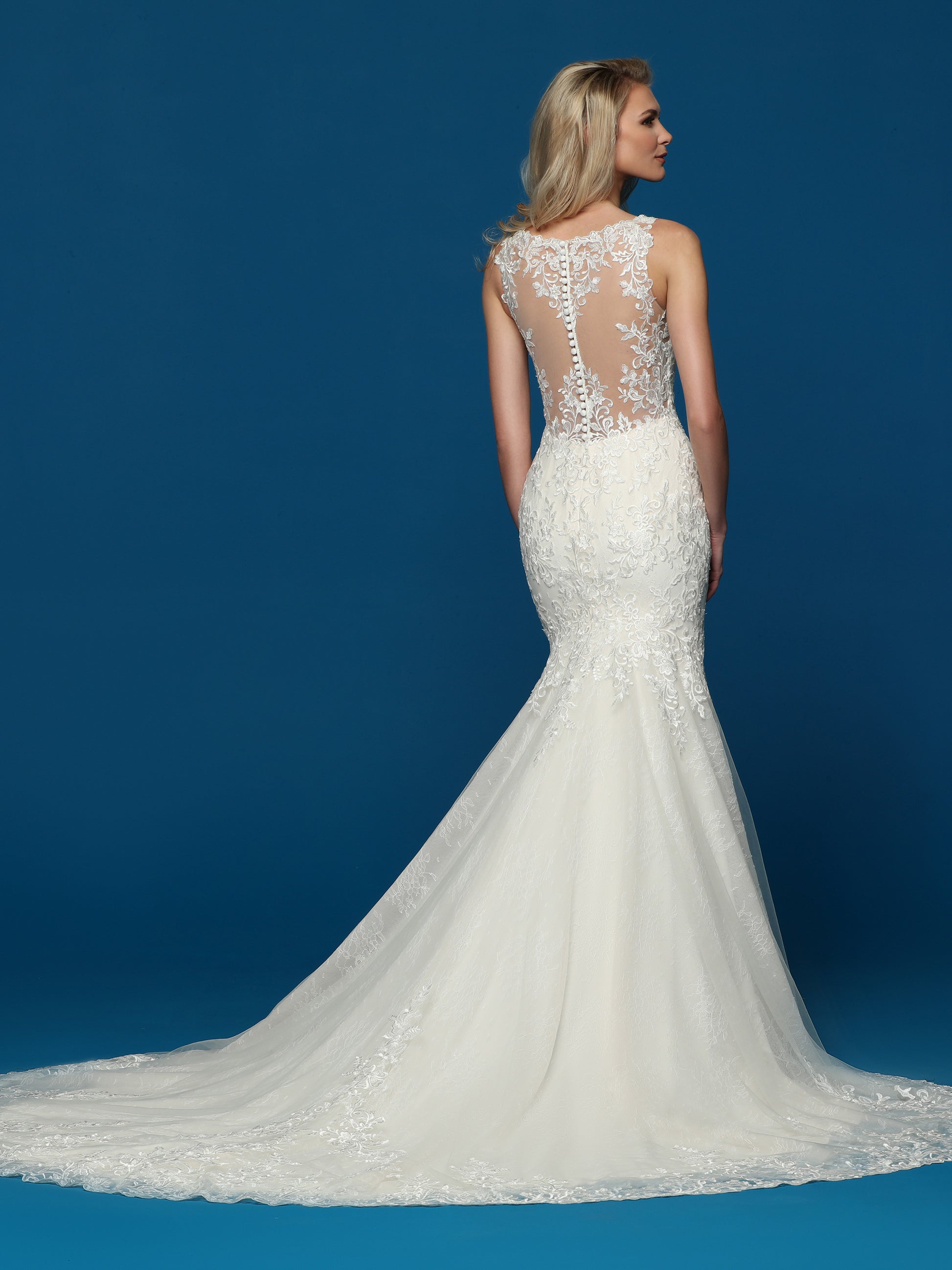 Davinci Bridal 50633 Long Lace Fit & Flare Wedding Dress Train Sheer Open Back Gown Elegant Lace & Tulle Fit & Flare Sheath Wedding Dress has a V-Neckline & Full Coverage Sheer Back with Covered Buttons. Lace Applique Covers the Bodice, Frames the Back & Extends Below the Knee. Contoured at the Back for a Mermaid Effect & a Fuller Train, the Tulle Lace Skirt features a Sheer Tulle Overlay with Wide Lace Applique at the Hem & Chapel Train. Available with a Two-Tone Color Option.