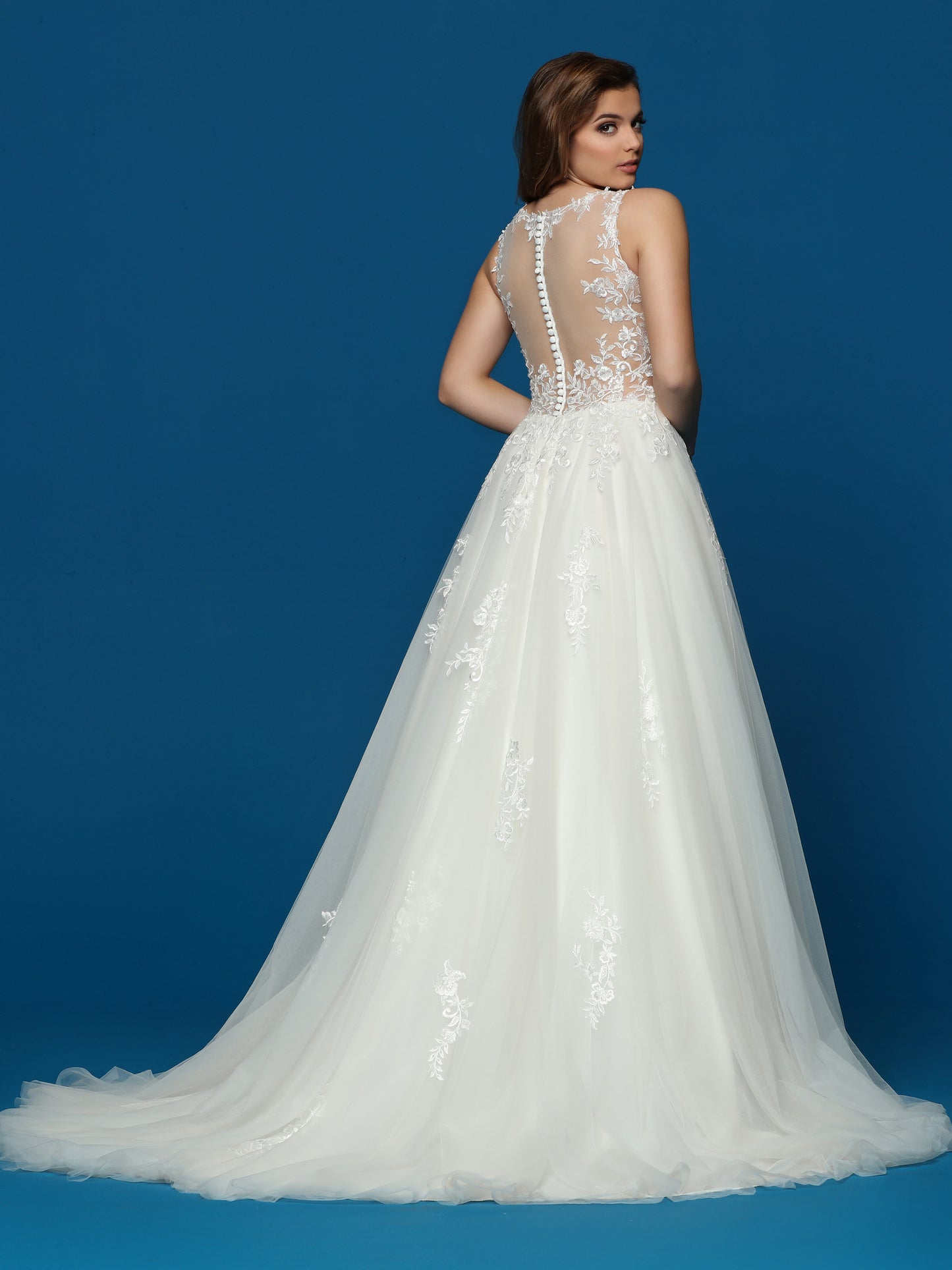 Davinci Bridal 50650 Long A Line Tulle Wedding Dress Sheer Lace Open Back Gown Feminine Lace & Tulle A-Line Ball Gown Wedding Dress has a V-Neckline, Sheer Back, Covered Buttons & Lace Applique Bodice. The Full Multi-Layer Tulle Skirt features Lace Applique Accents & a Chapel Train. Available with Two-Tone Color Option.