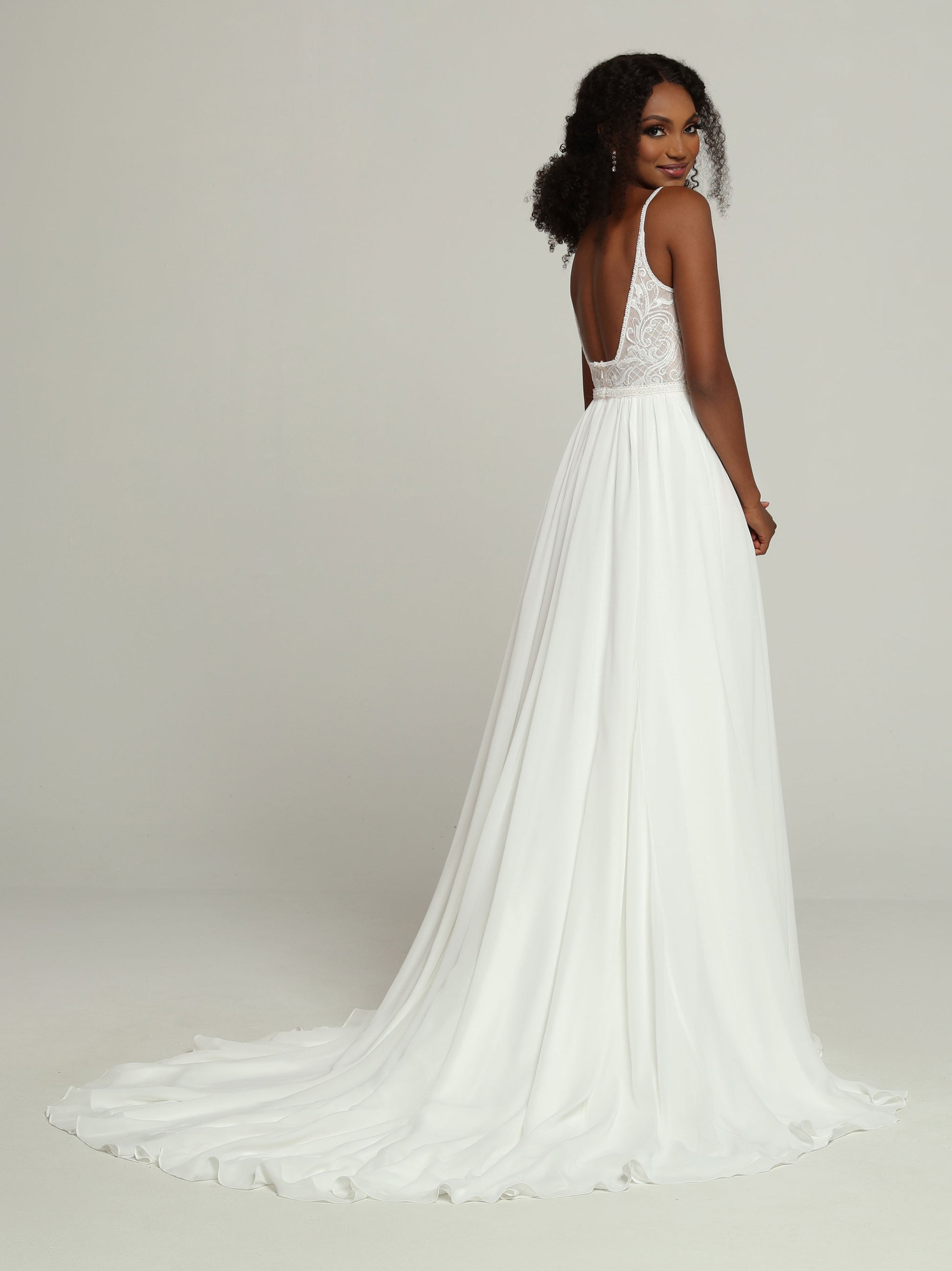 Davinci Bridal 50682 Long Chiffon Beaded A Line wedding dress Bridal Gown This On-Trend Chiffon A-Line Wedding Dress features a Sheer Lace Applique Bodice with Deep V-Neckline, Beaded Straps & an Open Back. The Full Skirt has a Narrow Beaded Waistband Belt Accent & a Chapel Train