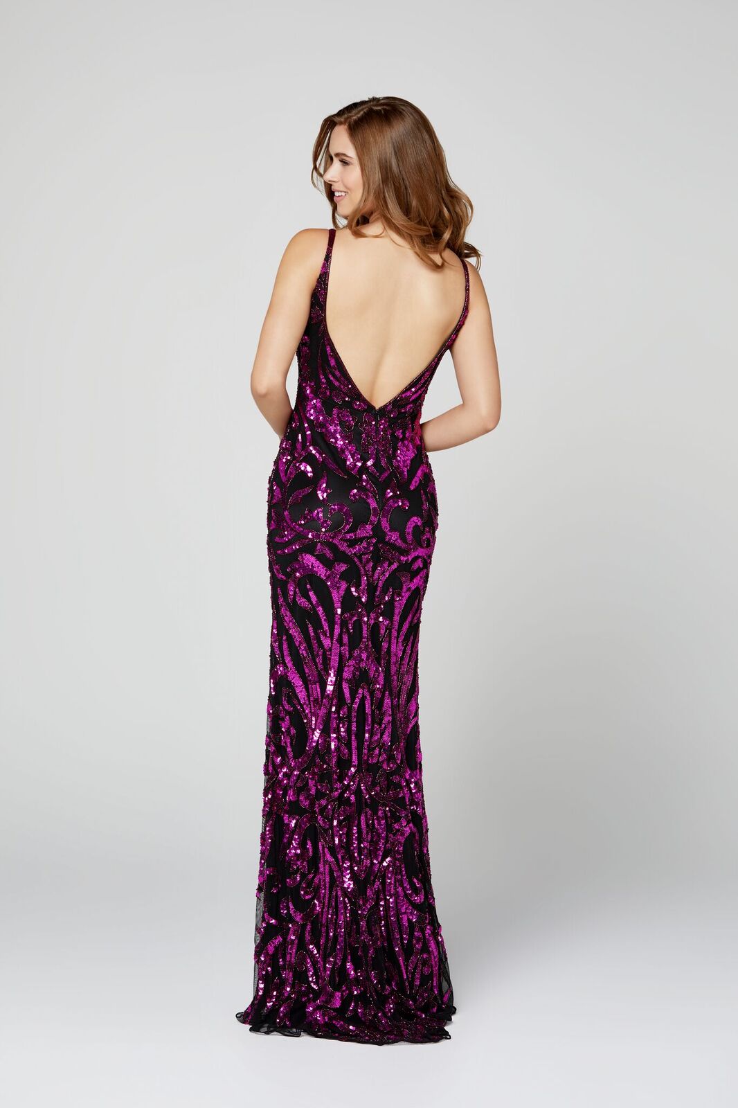 Primavera Couture 3454 is a Sequin Designer Prom, Pageant & Formal Dress. Featuring a Plunging V neckline with mesh panel. Embellished sequins & Hand beading along the entire gown in a damask print. Great evening gown. Open scoop back.