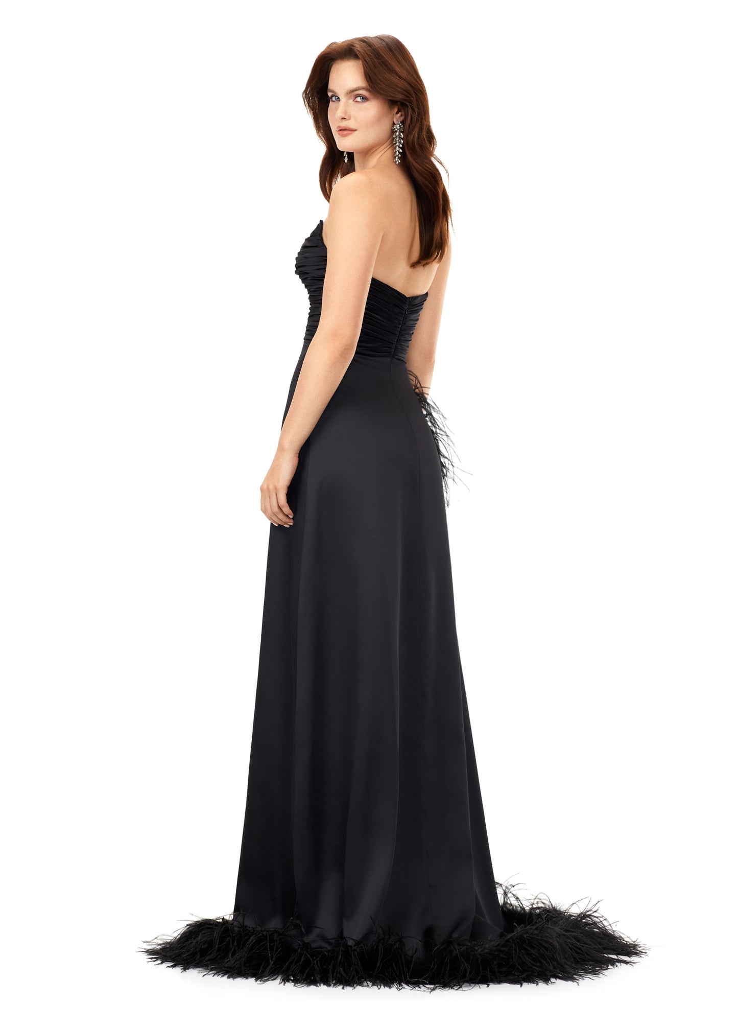 Ashley Lauren 11313 Black Prom, Pageant, Reception, Formal Evening Dress. We love a feather moment! This strapless satin gown features a ruched bodice giving way to a slight a-line skirt. The skirt is complete with a high right leg slit trimmed in feathers that continue to cascade down the hemline. black