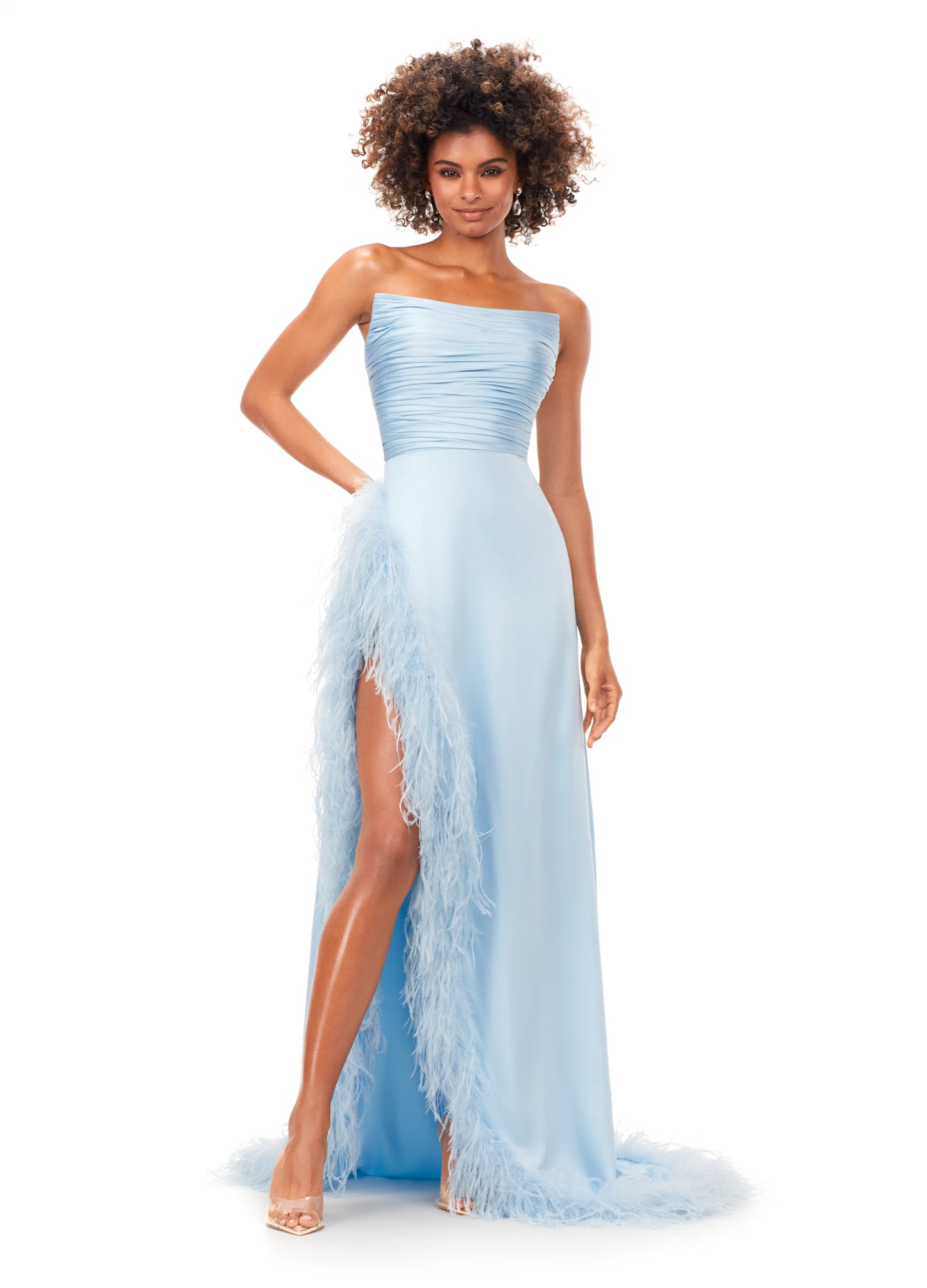 Ashley Lauren 11313 Sky Blue Prom, Pageant, Reception, Formal Evening Dress. We love a feather moment! This strapless satin gown features a ruched bodice giving way to a slight a-line skirt. The skirt is complete with a high right leg slit trimmed in feathers that continue to cascade down the hemline. front