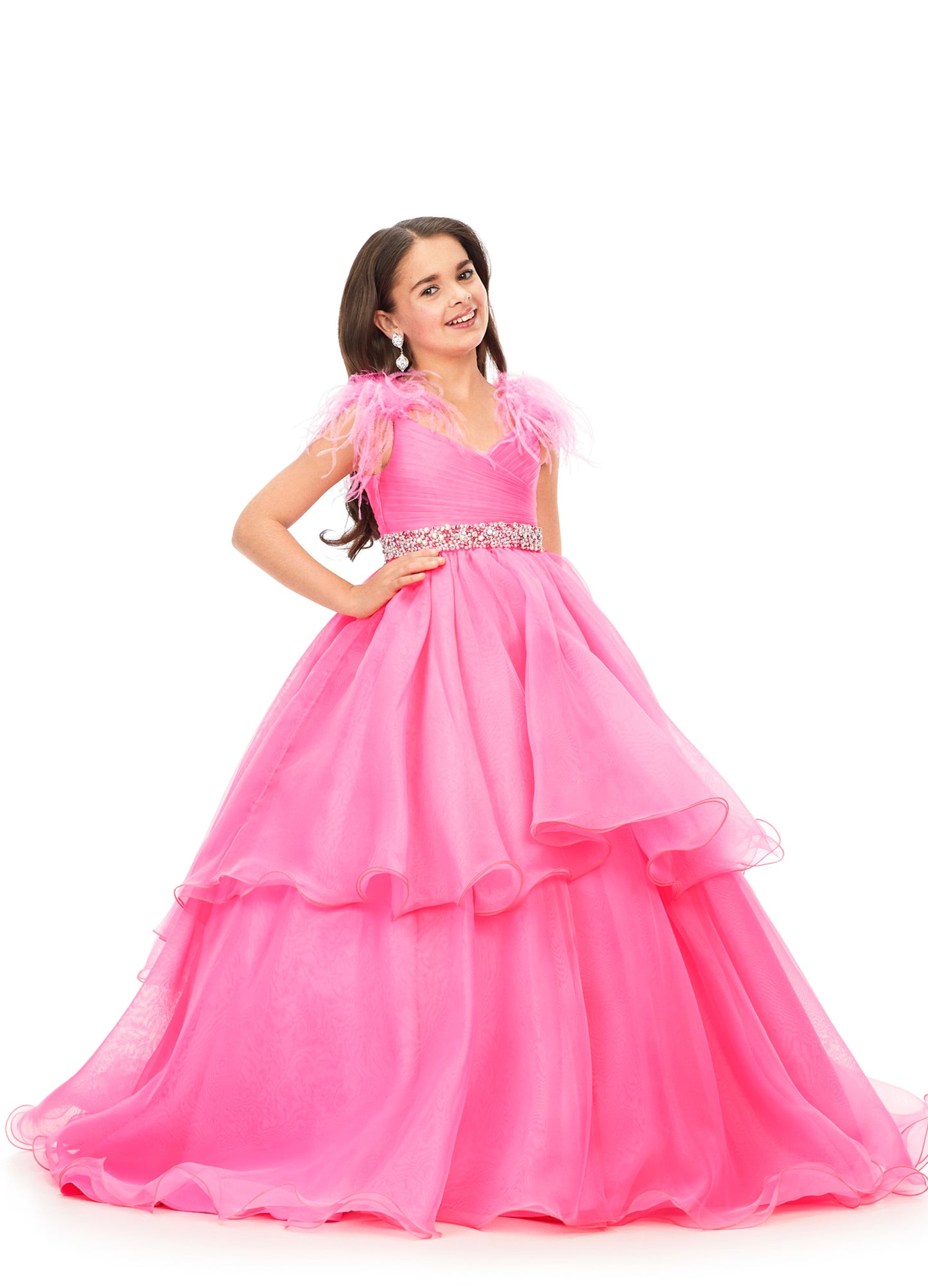 Ashley Lauren Kids 8184 Girls Pageant Dress Ball Gown with Feather Details  This organza kids ball gown features feather shoulders cascading to a crystal encrusted waistline. The layered skirt completes the look.