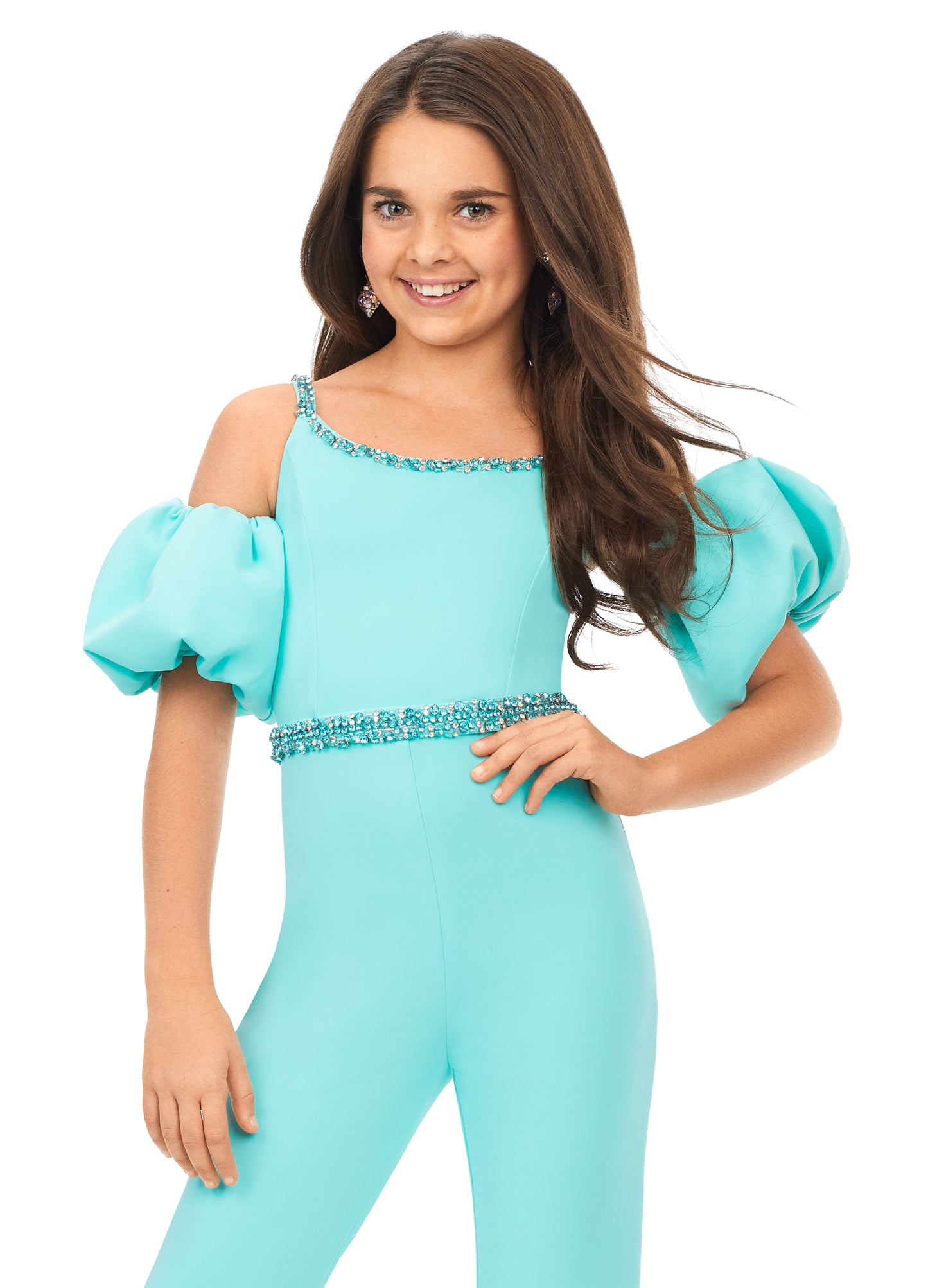 Ashley Lauren Kids 8164 Girls Off Shoulder Scuba Jumpsuit with Puff Sleeves  A scuba jumpsuit with off shoulder puff sleeves? We're obsessed! This jumpsuit has a beaded neckline and waist band to offer the right mix of classy and fabulous.