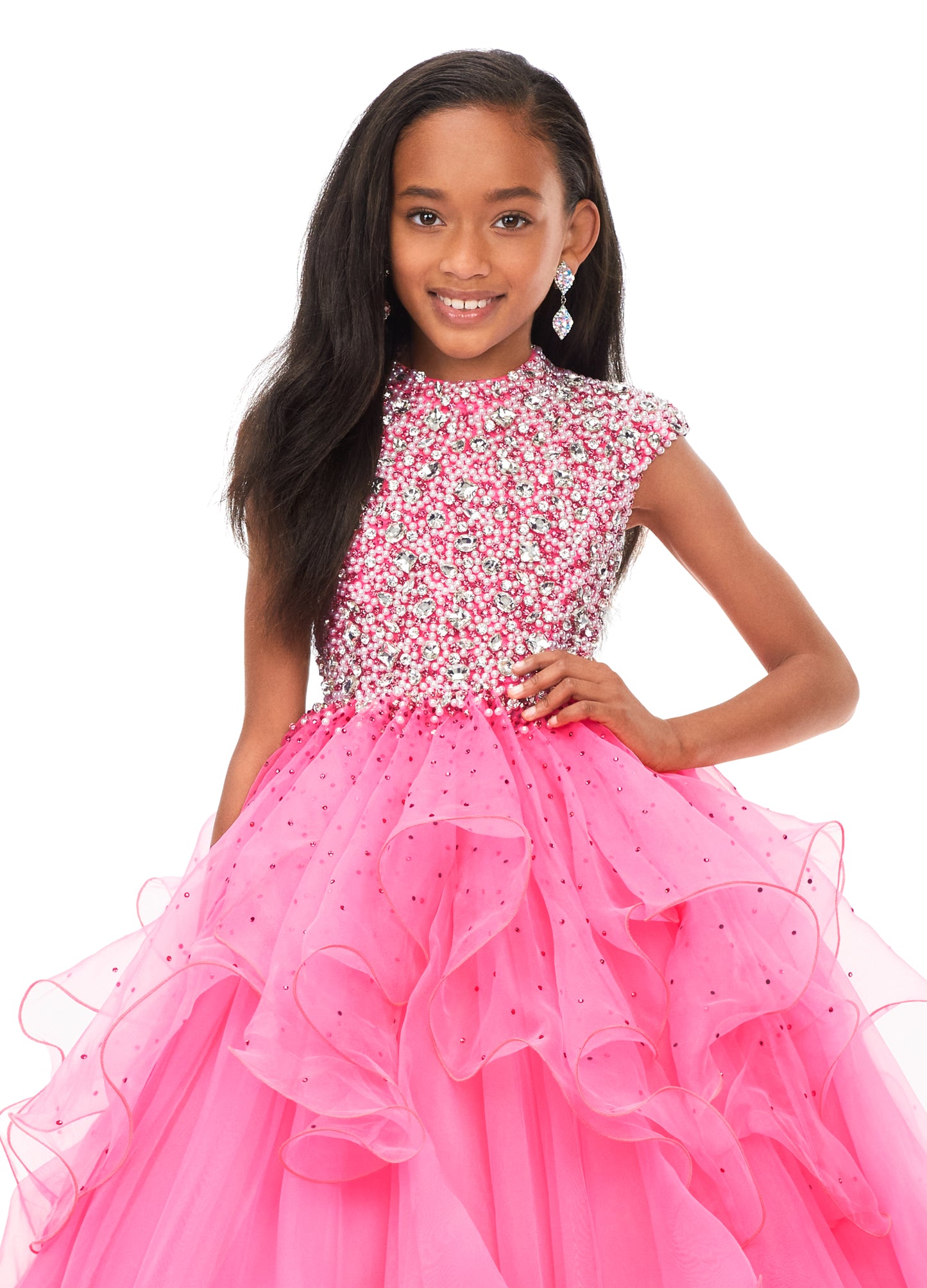 Ashley Lauren Kids 8180 Girls High Neckline Ball Gown with Organza Ruffle Pageant Skirt  Make them stop and stare in this kids high neckline ball gown with cap sleeves. The fully encrusted crystal and pearl bodice is sure to have all eyes on you. The a-line organza ruffle skirt is complete with scattered heat set stones throughout.