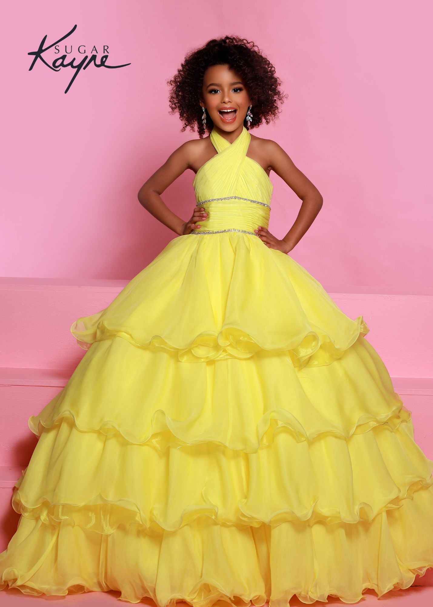 Sugar Kayne C305 Layer Girls Ruffle Pageant Ball Gown Cape Halter Formal Dress Oh s'cute!! This poly chiffon layered ballgown features a crisscross halter neckline with beaded trim along the waist. The train will float seamlessly across the stage, especially with the detachable cape.  Colors: Baby Blue, Lemon, White  Sizes: 2, 4, 6, 8, 10, 12, 14, 16  Fabric Poly Chiffon, Satin Lining